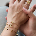 Bracelet with stones in oval charm