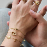 Bracelet with stones in oval charm