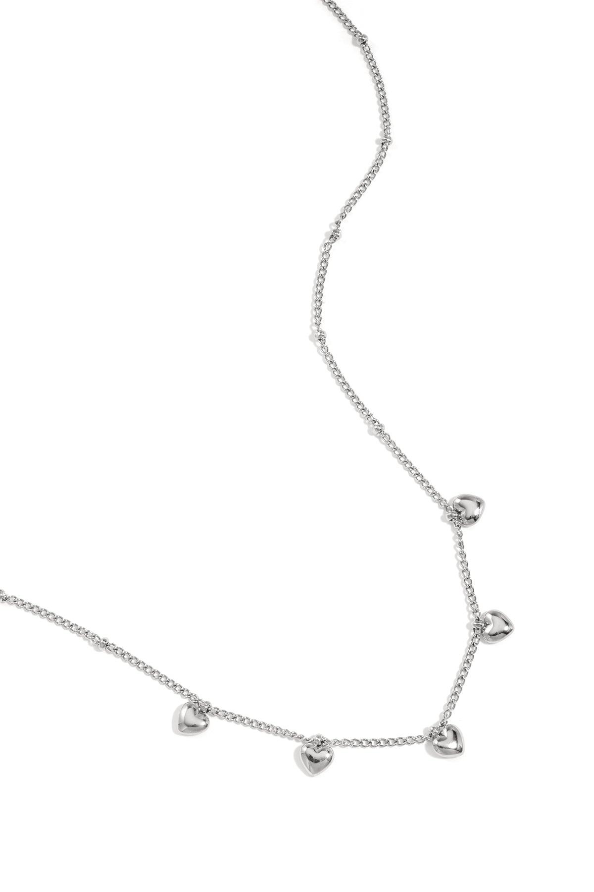 Minimalist necklace with small hearts
