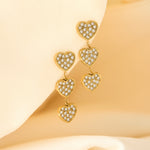 Earrings with 3 embellished hearts