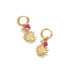 Earrings with sun charm and beads