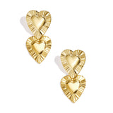 Earrings with heart-shaped pendants