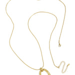 Long necklace with oval striped pendant