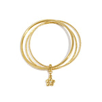 Bangles with hanging flower charm