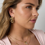 Necklace with cross and star charms