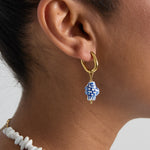 Squoval earrings with checkered fish charm