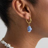 Squoval earrings with checkered fish charm