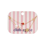 Charm bracelet with star and flower charms, pearls, stones and beads