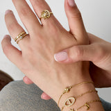 Adjustable ring with heart-shaped stone and heart