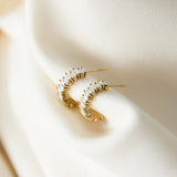 Earrings with zigzag stones