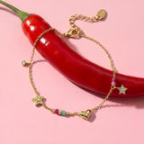 Charm bracelet with heart, star, stones and beads