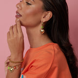 Earrings with colorful beads and detailed heart charm