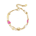 Charm bracelets with stones, beads, and coin