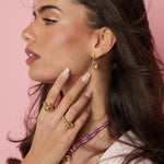 Earrings with flower pendant