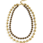 Linked necklace with gold and colored beads
