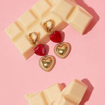 Heart-shaped pendant earrings