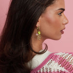 Oval hoop earrings with sun and bead charms