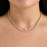 Double chain with minimalist heart and cubic zirconia