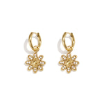 Earrings with decorated hanging flower