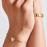Bracelet with pearl, stone and statement heart