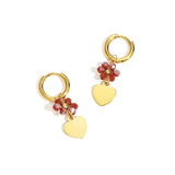 Earrings with heart on beaded flower