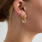 Oval earrings with set circle pendant