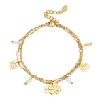 Bracelet with clover and bead charms