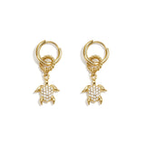 Earrings with a dangling turtle