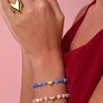 Beaded bracelet with heart-shaped centerpiece