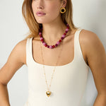 Necklace with beads of different sizes