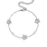 Bracelet with an alternating pattern of flowers and stones