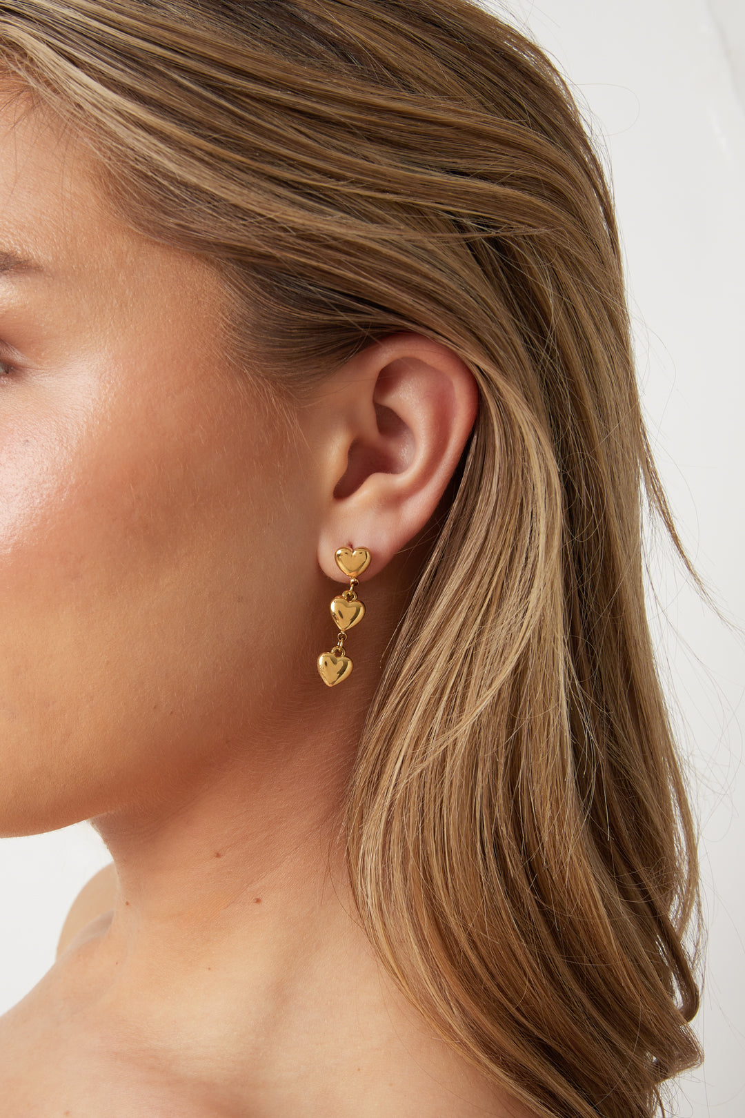 Earrings with 3 dangling hearts