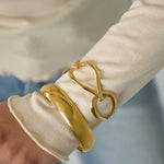 Bangle with open drops