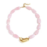 Necklace with asymmetric statement bead