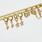Earrings with a dangling turtle