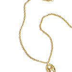 Chunky necklace with knot-shaped statement charm