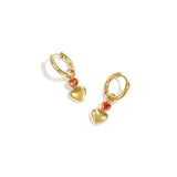 Earrings with dangling hearts and a heart-shaped stone