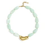 Necklace with asymmetric statement bead