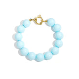 Bracelet with large beads and clasp at the front