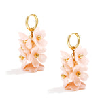 Earrings with a hanging wreath of flowers