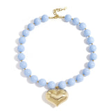 Bead necklace with hanging heart