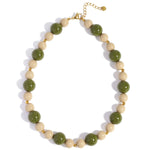 Necklace with beads of different sizes