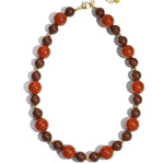 Necklace with beads of different sizes