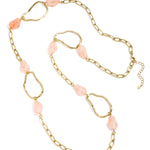 Long necklace with varying beads and shapes