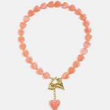 Bead necklace with hanging heart charms