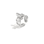 Layered statement ring with flower and stone