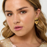 Bow earrings with hanging heart