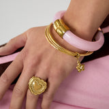 Bangles with hanging flower charm