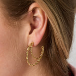 Double hoop earrings with twisted effect