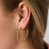 Double hoop earrings with twisted effect